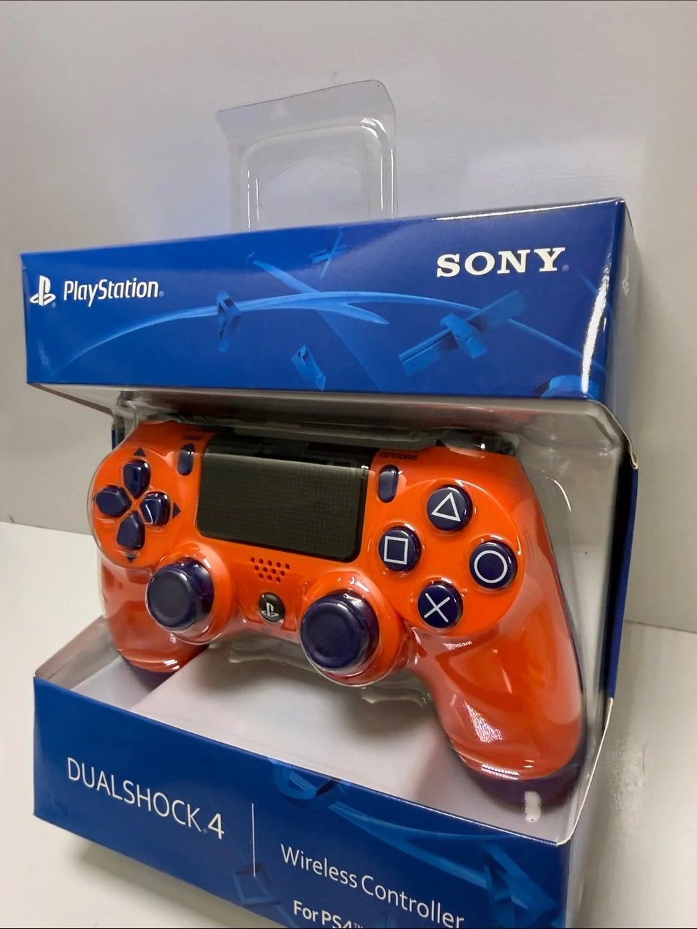 Sony DualShock 4 Wireless Controller - Orange with Dark Blue Buttons